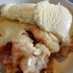 strawberry cream cheese cobbler with vanilla ice cream