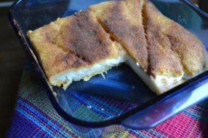 Easy cheese danish covered in cinnamon and baked in blue dish from www.ApronFreeCooking.com