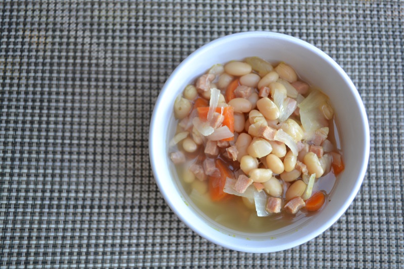 Irish Parliament Bean Soup in a white bowl from www.ApronFreeCooking.com