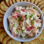 Mild Hot Crab Dip close up on plate of crackers