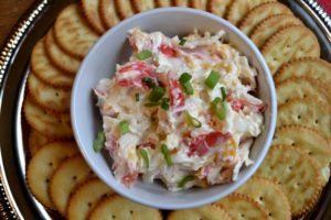 Mild Hot Crab Dip close up on plate of crackers