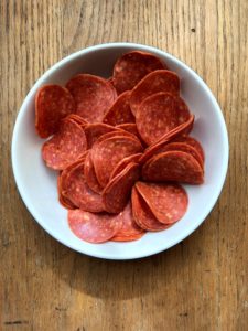 Meat lovers pasta ingredient pepperoni slices from www.ApronFreeCooking.com