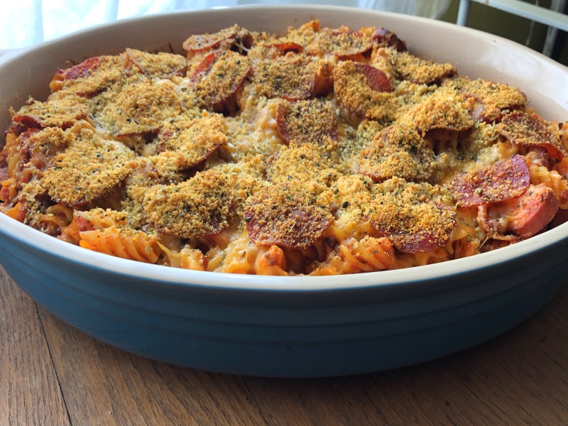 Baked meat lovers pasta horizontal overhead view of casserole dish from www.ApronFreeCooking.com