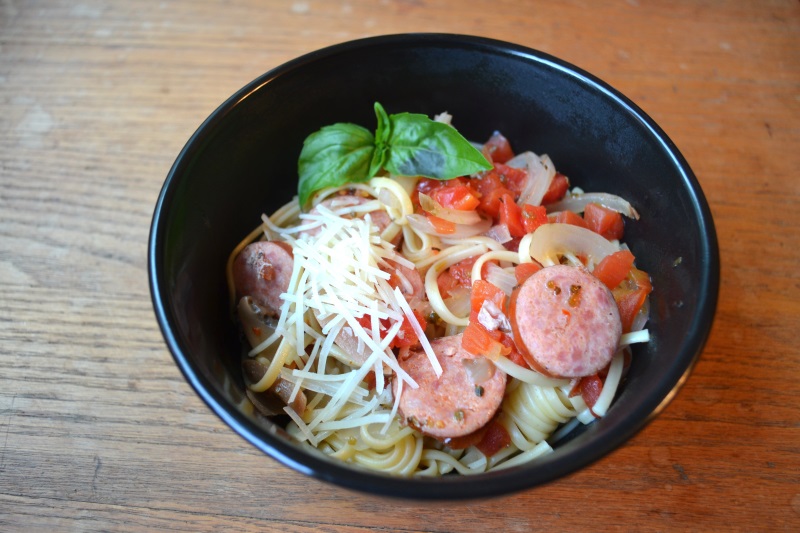 One Pot Italian Pasta served in black bowl on wooden table from www.ApronFreeCooking.com