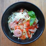 One Pot Italian Pasta in black bowl with basil garnish from www.ApronFreeCooking.com