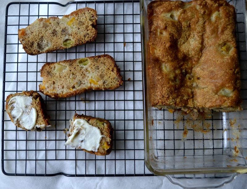 Fruit Cocktail Cake baked in loaf pan and sliced with cream cheese spread from www.ApronFreeCooking.com