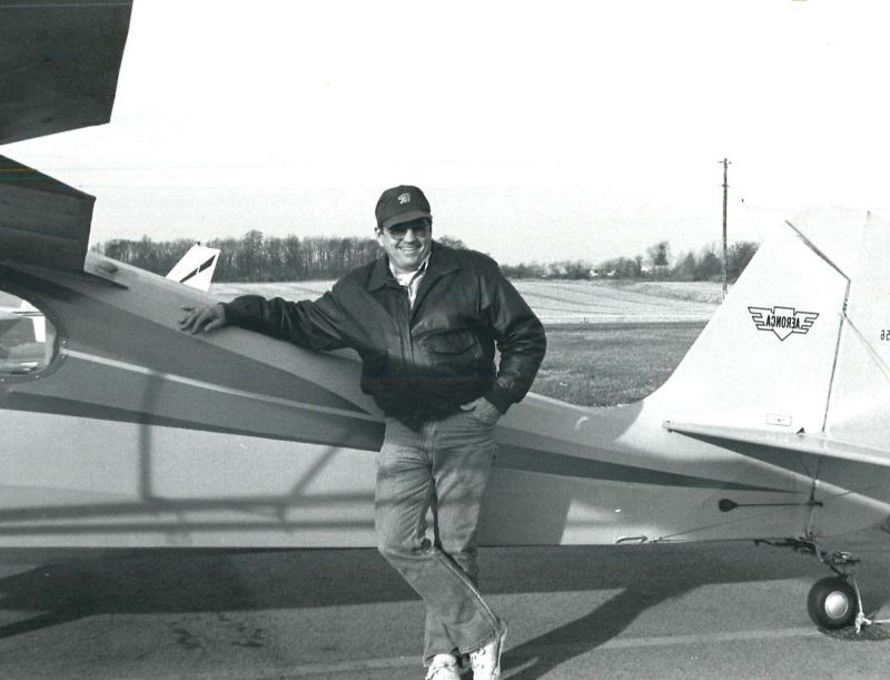 My Dad standing beside an airplane similar to the one we flew from Vermont to Ohio. 