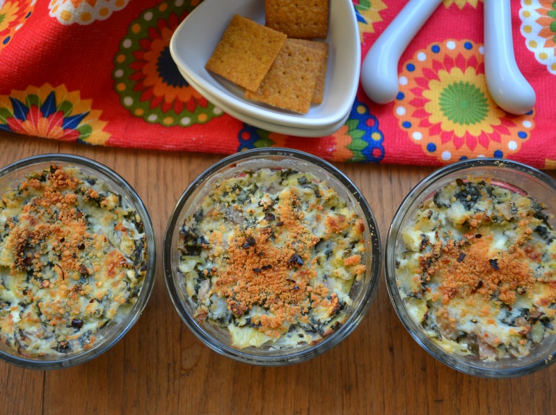 Spinach Artichoke Dip Individual Appetizers served with wheat crackers.