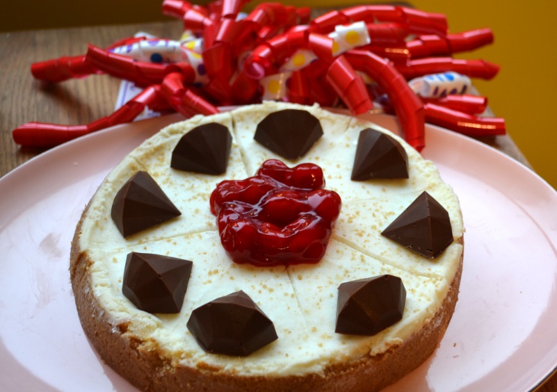Valentine Cheesecake with cherry topping and chocolate diamonds from www.ApronFreeCooking.com