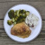 Roast chicken on white plate with broccoli and mashed potatoes from www.ApronFreeCooking.com