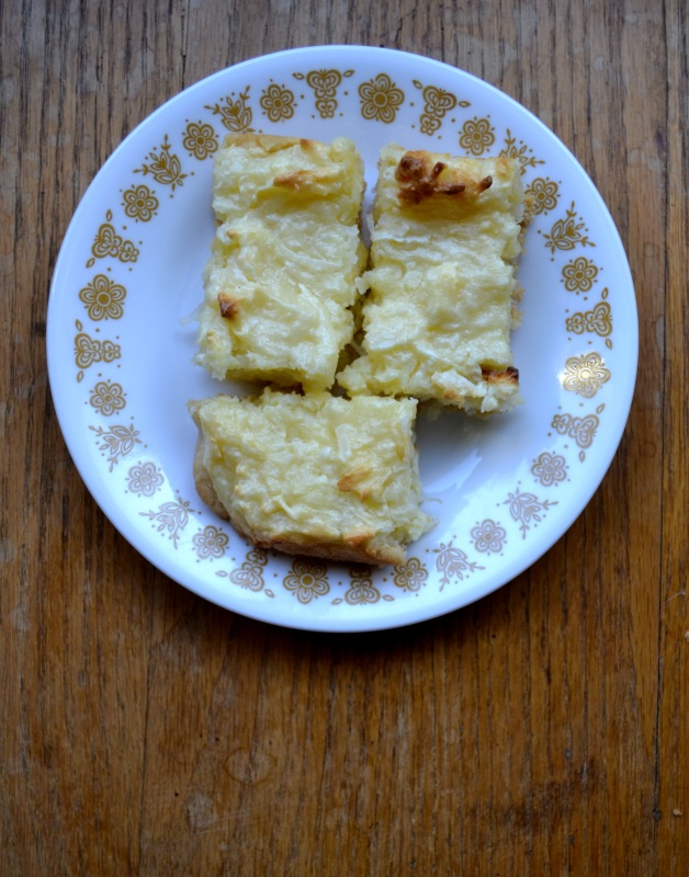 Coconut Cream Cheesecake slices on a dessert plate from www.ApronFreeCooking.com