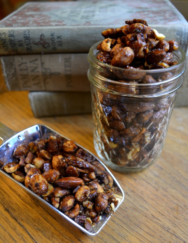 Coffee Glazed Nuts in canning jar with silver scoop full of nuts from www.ApronFreeCooking.com