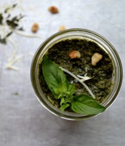 Walnut Basil Pesto in glass canning jar on silver tray from www.ApronFreeCooking.com