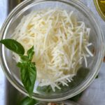 Parmesan is the second ingredient for Walnut Basil Pesto from www.ApronFreeCooking.com