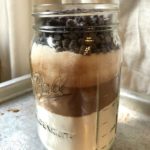 Death by Chocolate Mason Jar Cookies. Brown and white layers in a quart mason jar from www.ApronFreeCooking.com