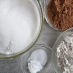 Mason Jar Brownie mix dry ingredients in bowls on silver sheet. from www.ApronFreeCooking.com