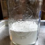 Leveled Mason Jar Brownies Flour poured into mason jar from www.ApronFreeCooking.com