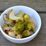 Oven Roasted Broccoli with onions in white bowl from www.ApronFreeCooking.om