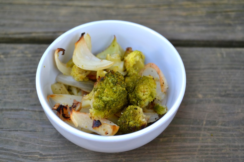 Oven Roasted Broccoli with onions in white bowl from www.ApronFreeCooking.om