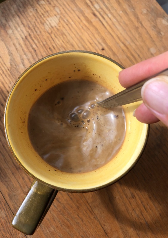 Mason Jar Pumpkin Spice Latte Mix in coffee mug, stirred with spoon from www.ApronFreeCooking.com