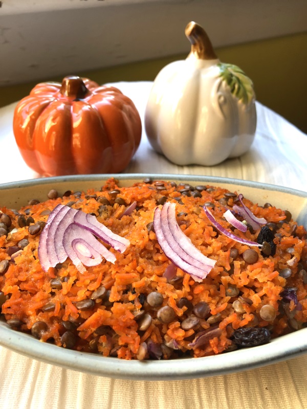 Rice and Lentils baked in casserole dish to serve alongside chicken from www.ApronFreeCooking.com