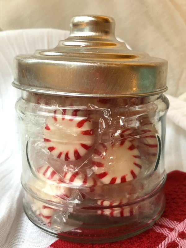 Whole peppermint candies for Vanilla Peppermint Creamer in glass jar with silver top, from www.ApronFreeCooking.com