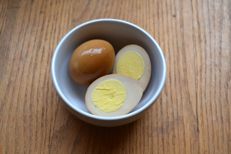 Smoked Pickled Eggs in white bowl from www.ApronFreeCooking.com