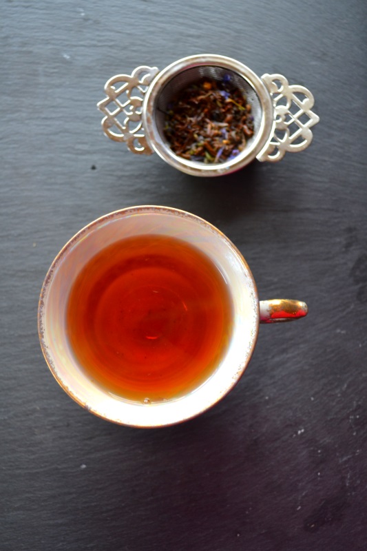 Cup of Blue Moon Tea on gray background from www.ApronFreeCooking.com