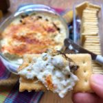 Herbal Cheese Dip served on cracker from www.ApronFreeCooking.com