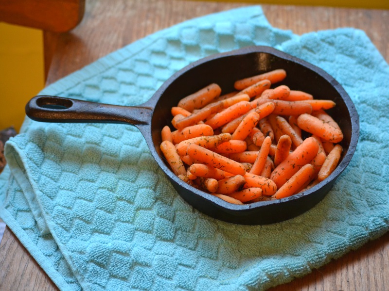 Dilly Carrots in cast iron skillet from www.ApronFreeCooking.com