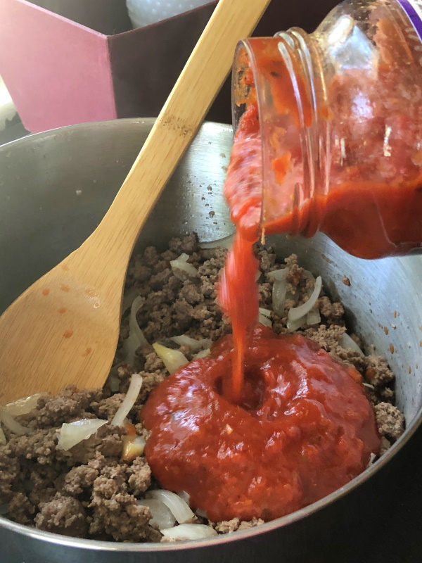 Johnny Marzetti Step 1 add sauce to browned ground beef