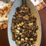 Herb Roasted Potatoes in ceramic boat shaped casserole dish